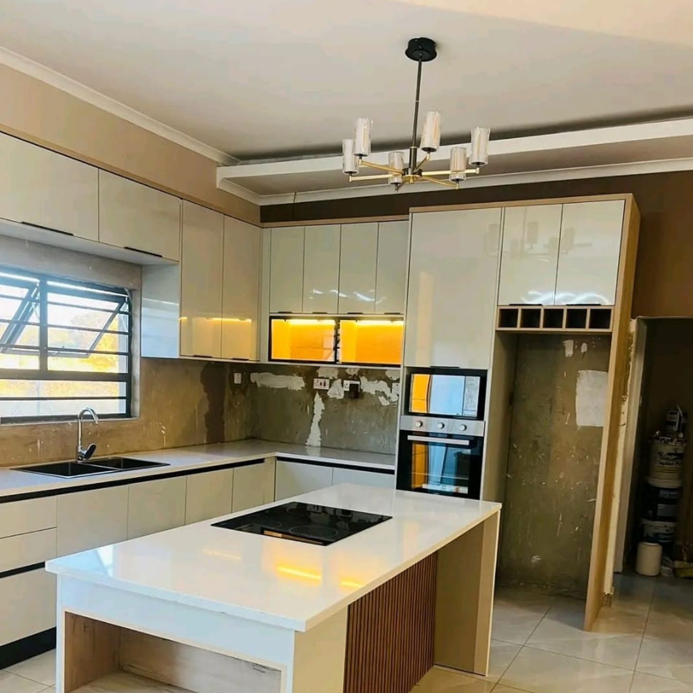Gloss kitchen with central cooking island