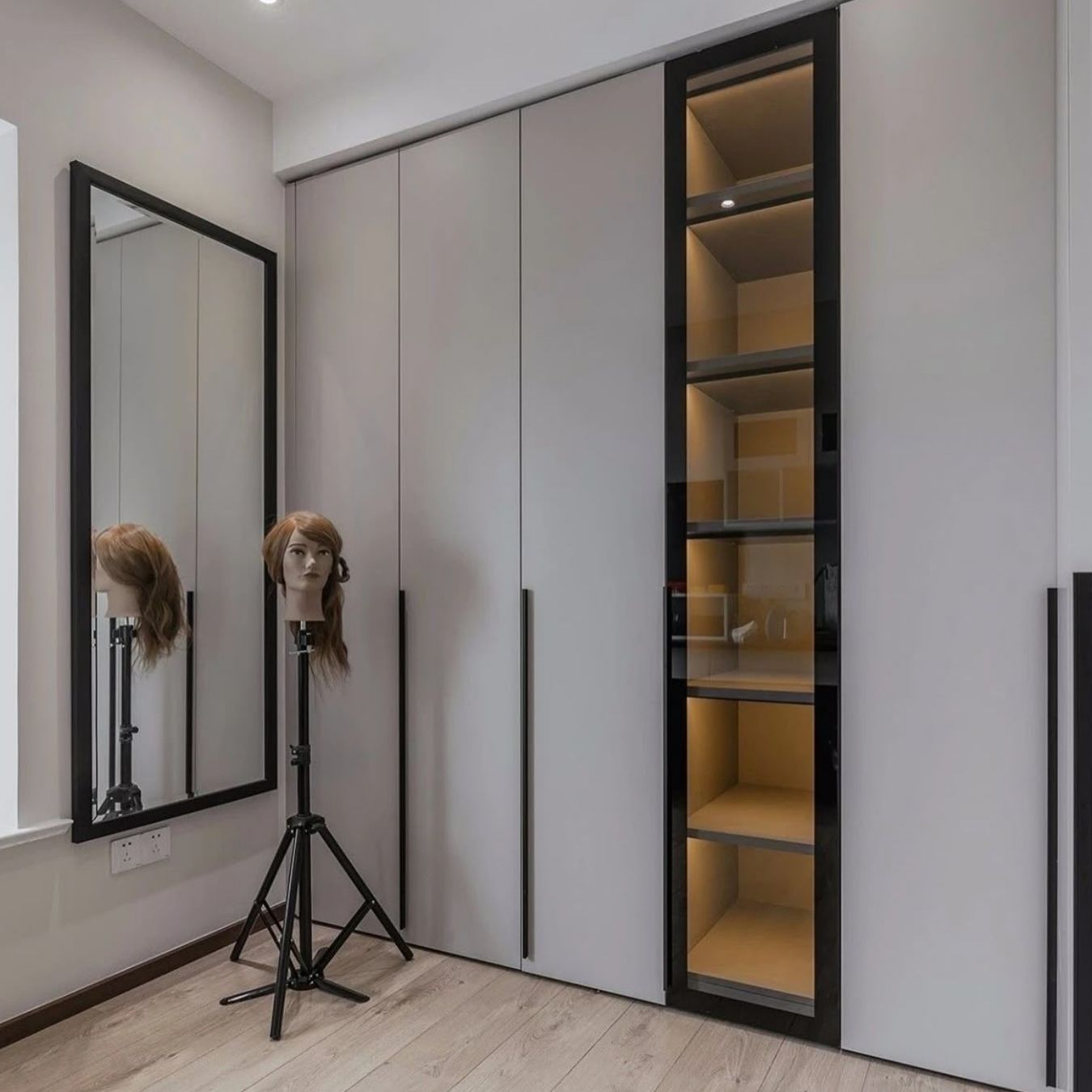Grey wall unit with LED column