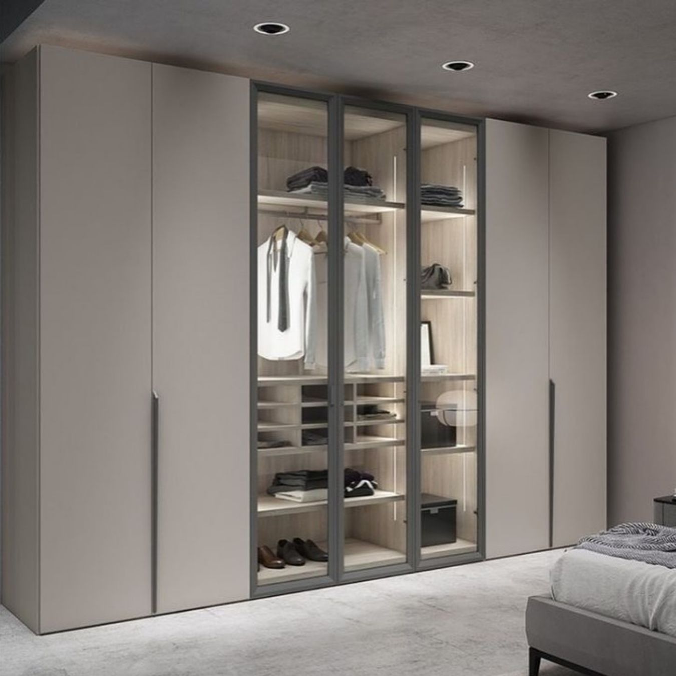 Framed glass display wardrobe with warm interior lighting